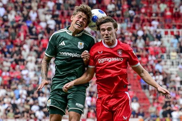 ENSCHEDE , 16-08-2026 , Stadium Grolsch Veste , season 2026 2027 , Dutch Eredivisie football , match between FC Twente and PEC Zwolle , picture shows PEC Zwolle player Elias Sorenson and FC Twente player Daan Rots Twente - PEC  x205775357x Copyright: