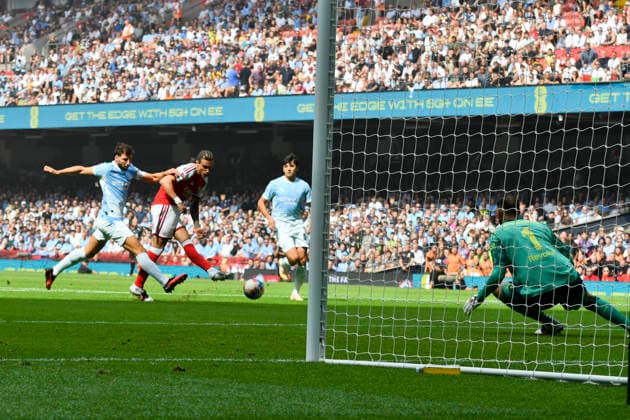 Football - 2026 FA Community Shield - Arsenal vs. Manchester City - Principality (Millennium) Stadium, Cardiff - Sunday 16th August 2026 Riccardo Calafiori scores his team s first goal Pic- COLORSPORT Winston Bynorth 