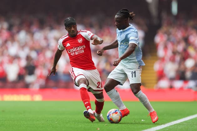 Arsenal v Manchester City FA Community Shield Jeremy Doku of Manchester City attacks whilst Noni Madueke of Arsenal attempts to tackle during the FA Community Shield match between Arsenal and Manchester City at the Principality Stadium, Cardiff 16 08 2026 UK Newspapers OUT Copyright: xKaraxThomasx FIL-23790-0034
