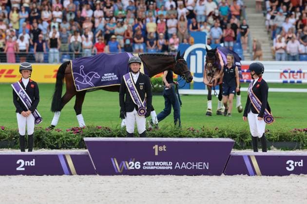 Siegerehrung Einzel, 1. Patz, Weltmeister, Michael Jung (GER, Deutschland, Germany), Pferd fischerChipmunk FRH, Chipmunk FRH, 2. Platz Rosalind Canter (GBR, Grossbritanien, Great Britain) Pferd Lordships Graffalo, Laura Collett (GBR, Grossbritanien, Great Britain) mit Pferd London 52, Vielseitigkeit , FEI Eventing World Championship, WM, Weltmeisterschaft , DHL-Preis, Einzel Mannschaft, AACHEN - FEI World Championships 2026, Weltfest des Pferdesports, Reitsport Weltmeisterschaft 2026, Aachen 2026, Welcome Home 2026, Aachener Soers, 11. bis 23. August 2026, Reitsport, 16.08.2026, Aachen Aachener Soers Deutschland *** Individual Medal Ceremony, 1st Place, World Champion, Michael Jung GER, Germany, Horse: fischerChipmunk FRH, Chipmunk FRH; 2nd Place: Rosalind Canter GBR, Great Britain, Horse: Lordships Graffalo, Laura Collett GBR, Great Britain, riding London 52, Eventing, FEI Eventing World Championship, DHL Prize, Individual and Team, AACHEN FEI World Championships 2026, World Festival of Equestrian Sports, 2026 Equestrian World Championships, Aachen 2026, Welcome Home 2026, Aachen Soers, August 11–23, 2026, Equestrian Sports, August 16, 2026, Aachen Soers, Germany