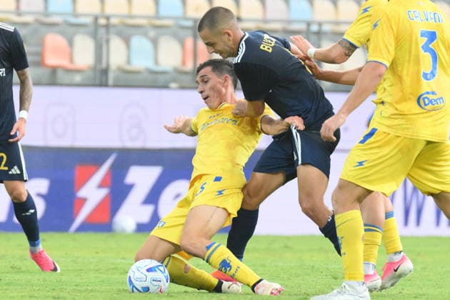 IPA87549855 - Illias Koutsoupias of Frosinone Calcio battles for the ball with Patrizio Masini of Frosinone Calcio during the Coppa Italia Freccia Rossa match between Frosinone Calcio and SS Juve Stabia at Benito Stirpe Stadium  Copyright: xAgostinoxGemito IPAxSportx xx 87549855