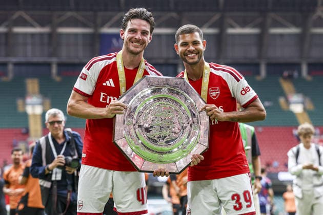 CARDIFF, WALES, AUG 16: Declan Rice and Bruno Guimaraes of Arsenal celebrates with trophy after Arsenal win the FA Community Shield match between Arsenal and Manchester City at the Millennium Stadium in Cardiff, Wales on 16th of August (photo by Qian Jun Sports Press Photo)  Copyright: xQianxJun SportsxPressxPhotox Sportspressphoto_SPR209514