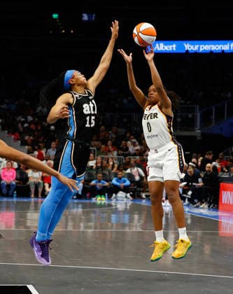 Guard Kelsey Mitchell 0 of the Indiana Fever shoots over guard Allisha Gray 15 of the Atlanta Dream in the second half at State Farm Arena on Sunday, August 16, 2026 in Atlanta, Georgia.  ATL20260816117 MikexZarrilli