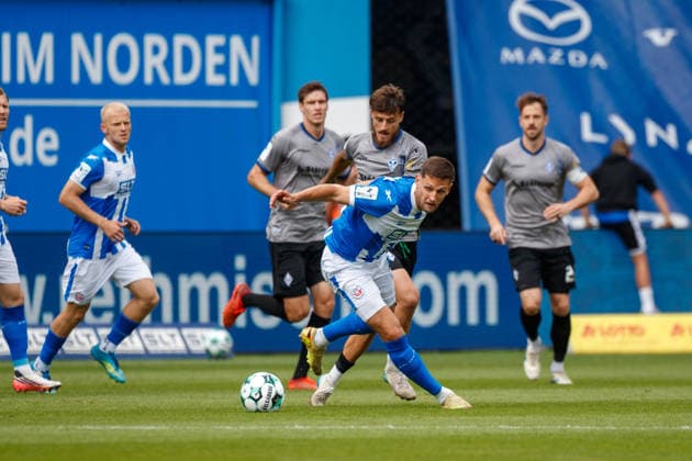 vorn Marco Schuster (Rostock) gegen Vincent Thill (Waldhof) ; GER, FC Hansa Rostock vs. SV Waldhof Mannheim, Fußball, Männer, 3.Liga, 02.Spieltag, Spielzeit 2026 2027, 16.08.2026 Rostock Ostseestadion Mecklenburg - Vorpommern Deutschland *** Starting lineup: Marco Schuster (Rostock) vs. Vincent Thill (Waldhof GER), FC Hansa Rostock vs. SV Waldhof Mannheim, Soccer, Men, 3rd Division, Matchday 2, 2026–2027 Season, August 16, 2026, Rostock Ostseestadion, Mecklenburg-Western Pomerania, Germany