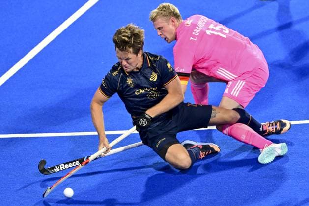 Belgium s Tom Boon and German Tom Grambusch fight for the ball during a hockey game between Belgian Lions and Germany, the second (out of three) matches during the group stage of the men s 2026 Hockey World Cup, Monday 17 August 2026 in Wavre. The 2026 edition of the Hockey World Cup takes place in Belgium and The Netherlands from August 15 to August 30. DIRKxWAEM  x183626340x