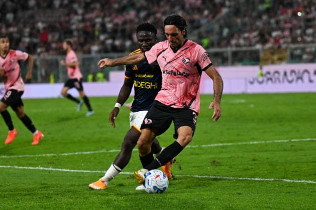 IPA87583748 - Tommaso Augello (Palermo F.C.) in action against Konan N Dri (U.S. Lecce) during the round of 32 of the Italian Cup between Palermo F.C. and U.S. Lecce on August 17, 2026, at the Renzo Barbera Stadium in Palermo, Italy  Copyright: xVincenzoxOrlando IPAxSportx xx 87583748