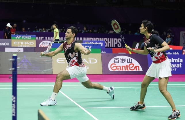 RECORD DATE NOT STATED BWF Badminton World Championships: India vs Canada New Delhi, Aug 18 (ANI): India s Rohan Kapoor and Ruthvika Shivani Gadde in action against Canada s Jonathan Bing Tsan Lai and Crystal Lai in the mixed doubles category during the BWF Badminton World Championships at Indira Gandhi Indoor Stadium, in New Delhi on Tuesday. New Delhi Delhi India Copyright: xANIx ANI_20260818035