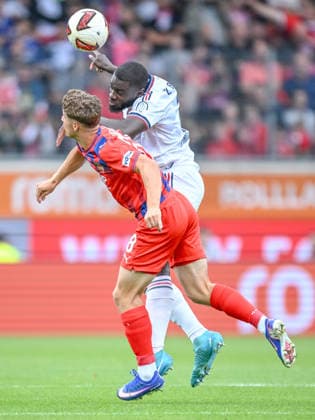 Yannik Wagner (1. FC Heidenheim 1846) und Dayot Upamecano (FC Bayern Muenchen) battle for the ball during the pre-Season Friendly match between 1.FC Heidenheim v FC Bayern Muenchen at Voith-Arena on August 18, 2026 in Heidenheim, Germany. (Photo by Harry Langer DeFodi Images) - *** Yannik Wagner of 1 FC Heidenheim 1846 and Dayot Upamecano of FC Bayern Munich battle for the ball during the preseason friendly match between 1 FC Heidenheim and FC Bayern Munich at Voith Arena on August 18, 2026 in Heidenheim, Germany. Photo by Harry Langer, DeFodi Images
