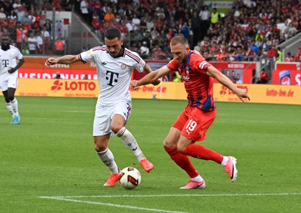 18.08.2026, xsltx, Fussball Testspiel, 1.FC Heidenheim - FC Bayern München v.l. Arijon Ibrahimovic (FC Bayern München), Jonas Föhrenbach (1. FC Heidenheim 1846) (DFL DFB REGULATIONS PROHIBIT ANY USE OF PHOTOGRAPHS as IMAGE SEQUENCES and or QUASI-VIDEO) *** August 18, 2026, xsltx, soccer exhibition match, 1 FC Heidenheim vs. FC Bayern Munich and Arijon Ibrahimovic of FC Bayern Munich, Jonas Föhrenbach 1 FC Heidenheim 1846 DFL DFB REGULATIONS PROHIBIT ANY USE OF PHOTOGRAPHS AS IMAGE SEQUENCES AND OR QUASI-VIDEO