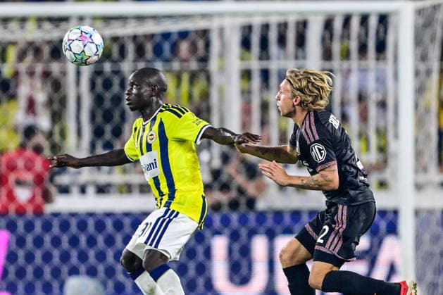 Fenerbahce v Olympique Lyonnais - UEFA Champions League ISTANBUL, TURKIYE - AUGUST 18: N Golo Kante of Fenerbahce in action against Mads Bidstrup during the UEFA Champions League play-off round first-leg match between Fenerbahce and Olympique Lyonnais at Chobani Stadium on August 18, 2026, in Istanbul, Turkiye. Cem Tekkesinoglu Anadolu Istanbul Turkey. Editorial use only. Please get in touch for any other usage.  Copyright: x2026xAnadoluxCemxTekkesinoglux