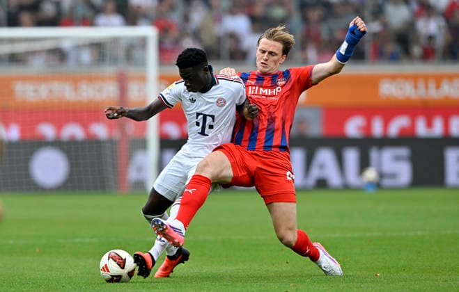 Zweikampf, Aktion Mikkel Kaufmann 1. FC Heidenheim 1846 FCH (29) gegen Bara Sapoko Ndiaye FC Bayern Muenchen FCB (39) 1. FC Heidenheim 1846 FCH vs FC Bayern Muenchen FCB TESTSPIEL 18.08.2026 DFL REGULATIONS PROHIBIT ANY USE OF PHOTOGRAPHS AS IMAGE SEQUENCES AND OR QUASI-VIDEO 1. FC Heidenheim 1846 FCH vs FC Bayern Muenchen FCB TESTSPIEL *** Tackle, Play by Mikkel Kaufmann (1 FC Heidenheim 1846 FCH 29) against Bara Sapoko Ndiaye (FC Bayern Munich FCB 39) 1 FC Heidenheim 1846 FCH vs. FC Bayern Munich FCB Friendly Match 08 18 2026 DFL regulations prohibit any use of photographs as image sequences and or quasi-video. 1 FC Heidenheim 1846 (FCH) vs. FC Bayern Munich (FCB) Friendly Match