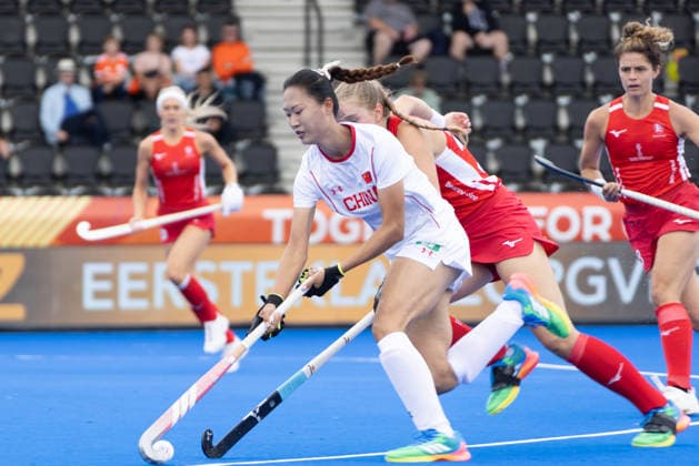 (260819) -- AMSTELVEEN, Aug. 19, 2026 -- Li Hong of China (front L) competes during the FIH Hockey World Cup 2026 women s Pool D match between China and England in Amstelveen, the Netherlands, Aug. 18, 2026. (Photo by Xinhua) (SP)THE NETHERLANDS-AMSTELVEEN-FIH HOCKEY WORLD CUP-WOMEN-CHINA VS ENGLAND SylviaxLederer 