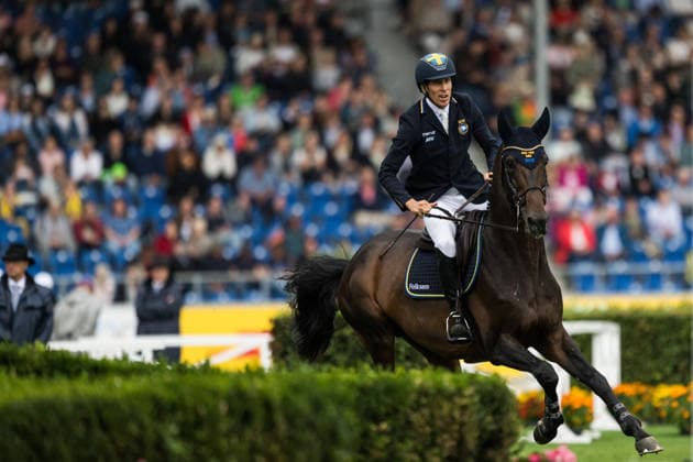 260819 Henrik von Eckermann of Sweden with horse Minute Man compete in the team and individual jumping qualifier round one during day 9 of the 2026 FEI World Championships on August 19, 2026 in Aachen. Photo: Emma Wallskog BILDBYRAN kod EW EW0689 ridsport equestrian rid-vm 2026 2026 fei world championships bbeng ridsport-vm hoppning jumping sverige *** August 19, 2026: Henrik von Eckermann of Sweden, riding Minute Man, competes in the first round of the team and individual show jumping qualifiers on Day 9 of the 2026 FEI World Championships, 2026 in Aachen. Photo by Emma Wallskog, BILDBYRAN, code EW EW0689. equestrian sports, 2026 World Championships, 2026 FEI World Championships, BBENG, equestrian sports, World Championships, show jumping, Sweden  Copyright: EMMAxWALLSKOG BB260819EW125