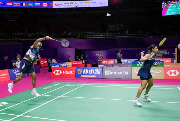 BWF World Championships 2026: India vs Macau New Delhi, Aug 19 (ANI): India s Dhruv Kapila and Tanisha Crasto in action against Macau s Leong Iok Chong and Weng Chi Ng during the mixed doubles match at the BWF World Championships 2026 at Indira Gandhi Indoor Stadium, in New Delhi on Wednesday. New Delhi Delhi India Copyright: xANIx ANI_20260819067