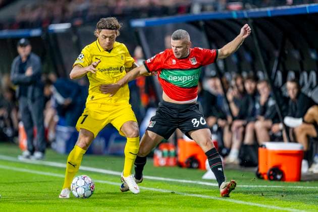NIJMEGEN - L-R FC Bodo Glimt middenvelder Patrick Berg, N.E.C. Nijmegen aanvaller Bryan Linssen tijdens de UEFA Champions League wedstrijd tussen N.E.C. en FC Bodo Glimt in Gofferpark op 19 augustus 2026 in Nijmegen, Nederland. - *** NIJMEGEN: FC Bodo Glimt midfielder Patrick Berg and NEC Nijmegen forward Bryan Linssen during the UEFA Champions League match between NEC and FC Bodo Glimt at Gofferpark on August 19, 2026, in Nijmegen, the Netherlands