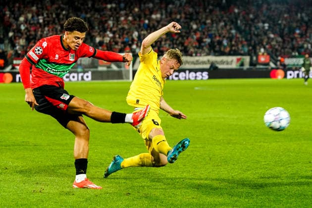 2026-08-19 NEC Nijmegen v Bodo Glimt - UEFA Champions League Play-offs - 1st leg NIJMEGEN, NETHERLANDS - AUGUST 19: Clement Bischoff of N.E.C. Nijmegen, Sondre Auklend of FK Bodo Glimt during the UEFA Champions League Play-offs - 1st leg match between NEC Nijmegen and Bodo Glimt at Goffertstadion on August 19, 2026 in Nijmegen, Netherlands. Nijmegen Goffertstadion Netherlands Content not available for redistribution in The Netherlands directly or indirectly through any third parties. Copyright: xAndrexWeeningx