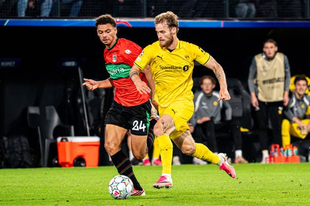 2026-08-19 NEC Nijmegen v FK Bodo Glimt - UEFA Champions League 2026 27 Play-Offs First Leg NIJMEGEN, NETHERLANDS - AUGUST 19: Deveron Fonville of NEC Nijmegen, Ole Didrik Blomberg of FK Bodo Glimt battle for the ball during the UEFA Champions League 2026 27 Play-Offs First Leg match between NEC Nijmegen and FK Bodo Glimt at Goffertstadium on August 19, 2026 in Nijmegen, Netherlands. (Photo by Gabriel Calvino Alonso BSR Agency) Nijmegen Netherlands Content not available for redistribution in The Netherlands directly or indirectly through any third parties. Copyright: xBSRxAgencyx