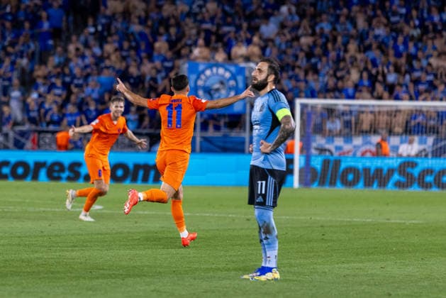 Milot Avdyli of Celje and Tigran Barseghyan of SK Slovan Bratislava seen during UEFA Champions league first play-off game between teams of SK Slovan Bratislava and Celje (Dominika Kortvelyesiova Ball Raw Images) Bratislava Tehelne Pole stadium Slovakia Copyright: xDominikaxKortvelyesiovax DKR_6065