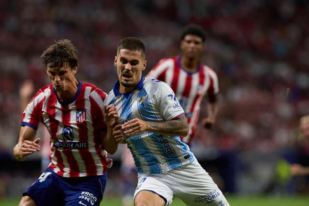 ESP: LaLiga EA Sports Atletico de Madrid v Malaga CF; Robin Le Normand of Atletico de Madrid and Carlos Ruiz Chupete of Malaga during LaLiga EA Sports between Atletico de Madrid v Malaga CF played at Riyadh Air Metropolitano Stadium in Madrid on August 19, 2026 in Spain Spain Futbol *** ESP LaLiga EA Sports Atlético de Madrid vs. Málaga CF Robin Le Normand of Atlético de Madrid and Carlos Ruiz Chupete of Málaga during the LaLiga EA Sports match between Atlético de Madrid and Málaga CF played at Riyadh Air Metropolitano Stadium in Madrid on August 19, 2026 in Spain Spanish Soccer Copyright: xAgenciaxLOFx