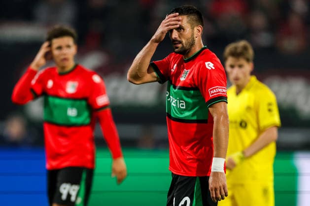 NIJMEGEN, NETHERLANDS - AUGUST 19: Dusan Tadic of NEC Nijmegen looks dejected during the UEFA Champions League 2026 27 play-offs first leg match between N.E.C. Nijmegen and FK Bodo Glimt at Goffertstadion on August 19, 2026 in Nijmegen, Netherlands.  Copyright: xRenexNijhuis MBxMediax