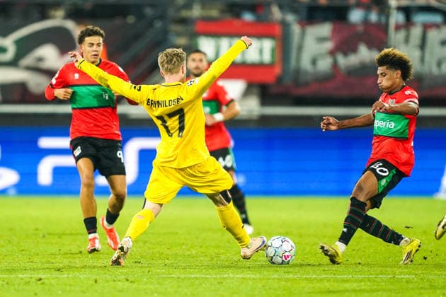 2026-08-19 NEC Nijmegen v Bodo Glimt - UEFA Champions League Play-offs - 1st leg NIJMEGEN, NETHERLANDS - AUGUST 19: Ola Brynhildsen of FK Bodo Glimt, Noe Lebreton of N.E.C. Nijmegen during the UEFA Champions League Play-offs - 1st leg match between NEC Nijmegen and Bodo Glimt at Goffertstadion on August 19, 2026 in Nijmegen, Netherlands. Nijmegen Goffertstadion Netherlands Content not available for redistribution in The Netherlands directly or indirectly through any third parties. Copyright: xAndrexWeeningx
