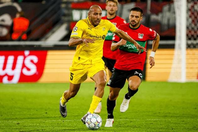 NIJMEGEN - Haitam Aleesami of FK Bodo Glimt (L) passes the ball under pressure from Dusan Tadic of NEC Nijmegen (R) during the UEFA Champions League Play-offs match between NEC Nijmegen and FK Bodo Glimt at the Goffertstadion on 19 August 2026 in Nijmegen, the Netherlands. WART BRINKERHOF ANP xVIxANPxSportx xMarcelxterxBalsxIVx 565837010 originalFilename: 565837010.jpg