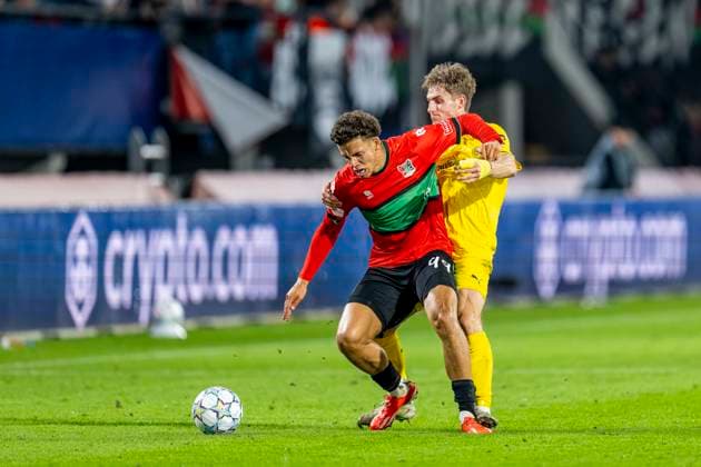 NIJMEGEN - L-R N.E.C. Nijmegen aanvaller Clement Bischoff en FC Bodo Glimt middenvelder Fredrik Sjovold tijdens de UEFA Champions League wedstrijd tussen N.E.C. en FC Bodo Glimt in Gofferpark op 19 augustus 2026 in Nijmegen, Nederland. - *** NIJMEGEN: NEC Nijmegen forward Clement Bischoff and FC Bodo Glimt midfielder Fredrik Sjovold during the UEFA Champions League match between NEC and FC Bodo Glimt at Gofferpark on August 19, 2026, in Nijmegen, the Netherlands