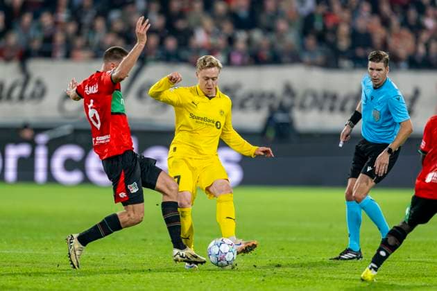 NIJMEGEN - L-R N.E.C. Nijmegen middenvelder Darko Nejasmic en FC Bodo Glimt aanvaller Ola Brynhildsen tijdens de UEFA Champions League wedstrijd tussen N.E.C. en FC Bodo Glimt in Gofferpark op 19 augustus 2026 in Nijmegen, Nederland. - *** NIJMEGEN: NEC Nijmegen midfielder Darko Nejasmic and FC Bodo Glimt forward Ola Brynhildsen during the UEFA Champions League match between NEC and FC Bodo Glimt at Gofferpark on August 19, 2026, in Nijmegen, the Netherlands