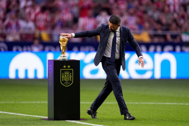 August 19, 2026, Madrid, Madrid, Spain: David Villa touches the World Champions trophy during the Spanish League, LaLiga EA Sports, football match played between Atletico de Madrid and Malaga CF at Riyadh Air Metropolitano stadium on August 19, 2026, in Madrid, Spain. Madrid Spain - ZUMAa181 20260819_zaa_a181_193 Copyright: xOscarxJ.xBarrosox