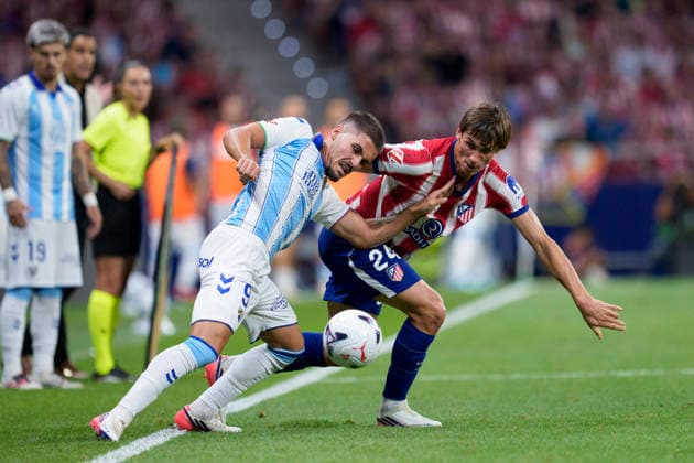 August 19, 2026, Madrid, Madrid, Spain: Chupe of Malaga CF and Robin Le Normand of Atletico de Madrid in action during the Spanish League, LaLiga EA Sports, football match played between Atletico de Madrid and Malaga CF at Riyadh Air Metropolitano stadium on August 19, 2026, in Madrid, Spain. Madrid Spain - ZUMAa181 20260819_zaa_a181_208 Copyright: xOscarxJ.xBarrosox