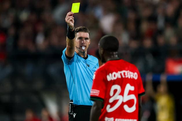 NIJMEGEN, NETHERLANDS - AUGUST 19: referee Francois Letexier shows a yellow card to Jamiro Monteiro of NEC Nijmegen during the UEFA Champions League 2026 27 play-offs first leg match between N.E.C. Nijmegen and FK Bodo Glimt at Goffertstadion on August 19, 2026 in Nijmegen, Netherlands.  Copyright: xRenexNijhuis MBxMediax