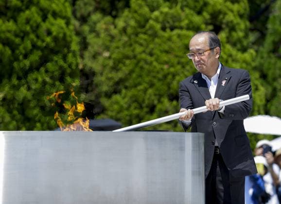 Asian Games: Torch-lighting ceremony Hiroshima Mayor Kazumi Matsui lights the torch for the Asian Games at the flame of peace at the Peace Memorial Park in Hiroshima, western Japan, on Aug. 20, 2026, ahead of the Sept. 19-Oct. 4 games that will mainly be held in Aichi Prefecture, central Japan.  A14AA0005626282P