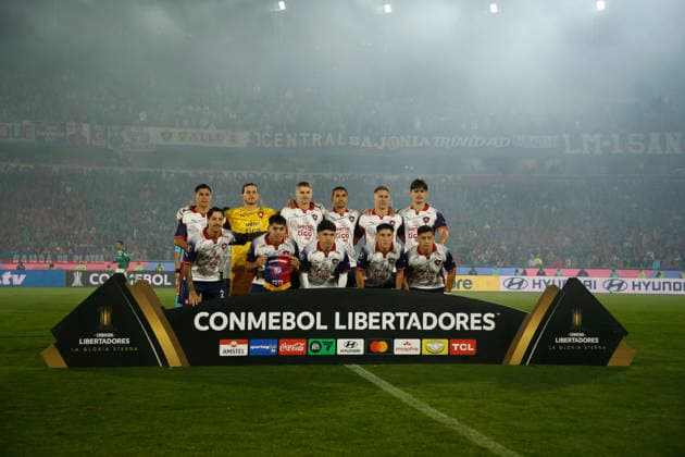 The Club Cerro Porteno starting eleven poses for a team group, Mannschaftsbild, Totale photo: Back row (L-R): Ivan Ramirez ( 16), Manuel Roffo ( 1), Lucas Quintana ( 14), Gustavo Velazquez ( 23), Alexis Canete ( 24), Marcelo Chaparro ( 35). Front row (L-R): Fabricio Dominguez ( 2), Ariel Gamarra ( 18), Jorge Morel ( 5), Ignacio Aliseda ( 31), Pablo Vegetti ( 19). Club Cerro Porteno v SE Palmeiras - Copa Libertadores Round of 16 second leg match - ASUNCION, PARAGUAY - AUGUST 19, 2026 Copyright: xSoccerxImagesx