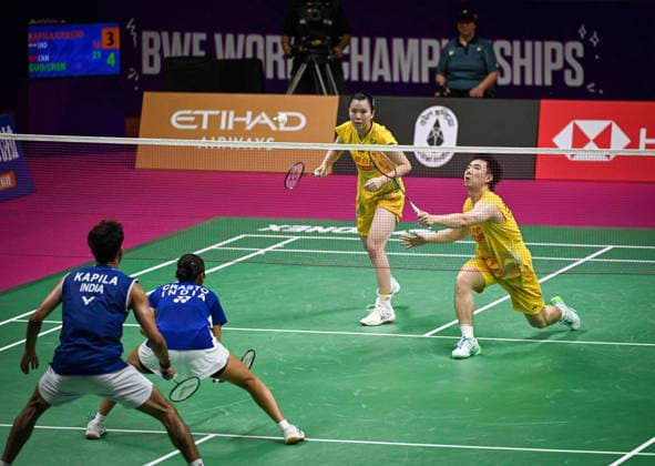 NEW DELHI, INDIA - AUGUST 20: Chinese mixed doubles pair Guo Xin Wa and Chen Fang Hui compete against Indian duo of Dhruv Kapila and Tanisha Crasto during their mixed doubles pre-quarterfinal match on day four of the BWF World Championships 2026 at the Indira Gandhi Indoor Stadium on August 20, 2026, in New Delhi, India. (Photo by Sanchit Khanna Hindustan Times) BWF World Championships 2026