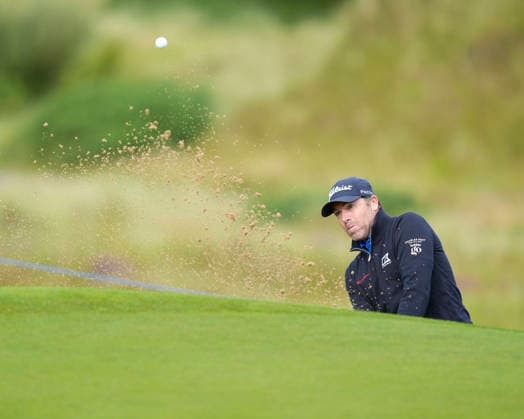 BALMEDIE, SCOTLAND - AUG 20: Julien Guerrier (FRA) plays from a green side bunker on the 13th hole during Round 1 at the 2026 Nexo Championship at the Trump International Golf Links, Balmedie on August 20, 2026 in Aberdeenshire, Scotland The 2026 Nexo Championship