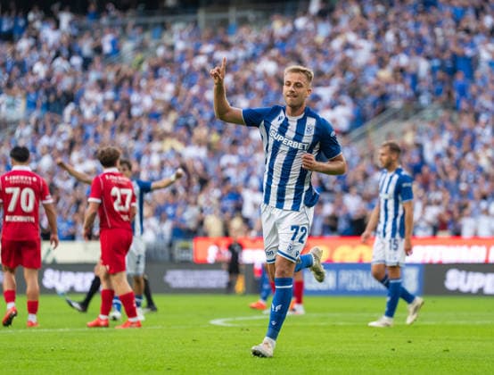 Mateusz Skrzypczak of KKS Lech Poznan celebrates the goal during UEFA Europa League - Playoff Round season 26 27 match between teams of KKS Lech Poznan and FC Thun (Ruslan Taran Ball Raw Images) Poznan Enea Stadium Poland Copyright: xRuslanxTaranx RUS_LECH-THUN-0046