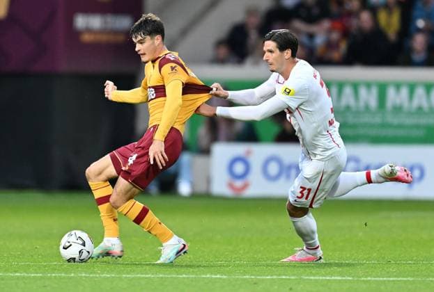 Jamie Knight-Lebel of Motherwell and Igor Matanovic of SC Freiburg Motherwell v Freiburg, UEFA Conference League, Play-Off Round, First Leg, Football, Fir Park, Motherwell, Scotland, UK - 20 Aug 2026Motherwell Fir Park Scotland United Kingdom  Copyright: xMarkxRunnacles Shutterstockx 17108687bg