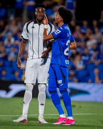 Getafe CF v FK Partizan - UEFA Conference League 2026 27 Play-Off Round First Leg Demba Sek of FK Partizan (L) and Johan Mojica of Getafe CF (R) are seen during the UEFA Conference League 2026 27 play-off round first leg football match between Getafe CF and FK Partizan at Estadio Coliseum on August 20, 2026 in Getafe, Spain. Getafe Estadio Coliseum Madrid Spain Copyright: xAlbertoxGardinx AGardin_20260820_Foot_Geta_Par_0058
