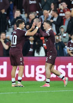 Heart of Midlothian v SK Rapid Wien UEFA Europa Conference League Josh McPake of Heart of Midlothian (right) celebrates scoring his teams first goal with Cl‡udio Braga of Heart of Midlothian during the UEFA Europa Conference League Play-Off First Leg match at Tynecastle Park, Edinburgh 20 08 2026 UK Newspapers OUT Copyright: xFredxPalmerx FIL-23809-0078