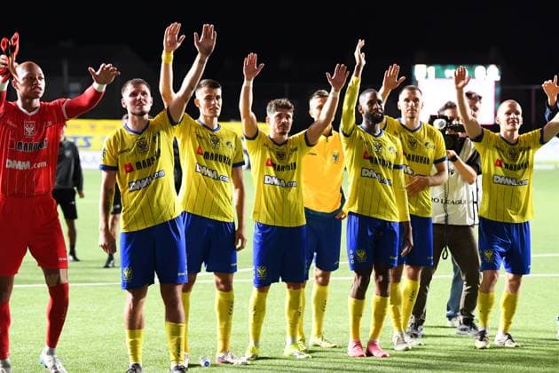 STVV s players celebrate after winning a soccer game between Belgian Sint-Truidense V.V. and Cypriot AC Omonoia Nicosia, Thursday 20 August 2026 in Sint-Truiden, the first leg of the play-off round for the UEFA Europa League league phase. JILLxDELSAUX  x183853466x