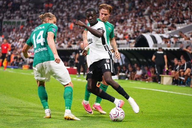ISTANBUL, TURKEY - AUGUST 20 : Kassoum Ouattara (11) of Besiktas and Vykintas Slivka (14) of Kauno Zalgiris battle for the ball during the UEFA Europa League 2026 27 Play-off round first leg match between Besiktas JK and Kauno Zalgiris at Tupras Stadium on August 20, 2026 in Istanbul, Turkey. Istanbul Turkey Copyright: xSeskimPhotox Besiktas-KaunoZalg-2008 (190)