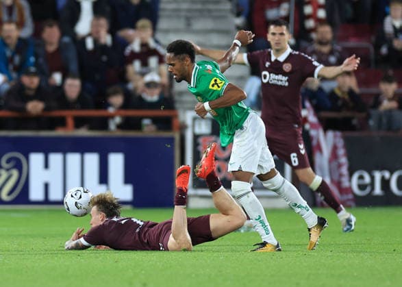 Heart of Midlothian v SK Rapid Wien UEFA Europa Conference League Calvin Miller of Heart of Midlothian is fouled by Petter Dahl of SK Rapid Wien during the UEFA Europa Conference League Play-Off First Leg match at Tynecastle Park, Edinburgh 20 08 2026 UK Newspapers OUT Copyright: xFredxPalmerx FIL-23809-0139