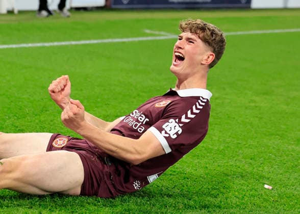 Heart of Midlothian v SK Rapid Wien UEFA Europa Conference League James Wilson of Heart of Midlothian celebrates scoring his teams second goal during the UEFA Europa Conference League Play-Off First Leg match at Tynecastle Park, Edinburgh 20 08 2026 UK Newspapers OUT Copyright: xFredxPalmerx FIL-23809-0195