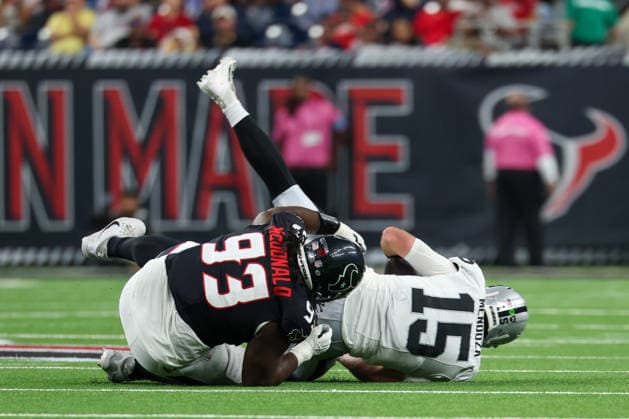 HOUSTON, TX - AUGUST 20: Quarterback Fernando Mendoza 15 of the Las Vegas Raiders is sacked by defensive tackle Kayden McDonald 93 of the Houston Texans during the NFL, American Football Herren, USA preseason game between the Houston Texans and the Las Vegas Raiders on August 20, 2026, at Reliant Stadium in Houston, TX. (Photo by David Buono Icon Sportswire) NFL: AUG 20 Raiders at Texans EDITORIAL USE ONLY Icon260820020
