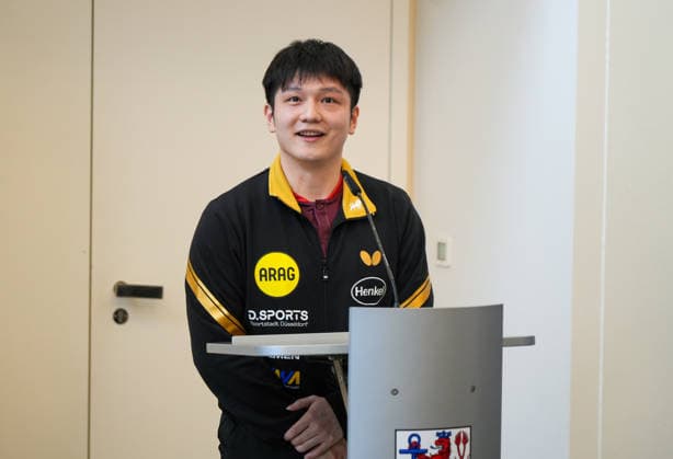 DUSSELDORF, GERMANY - AUGUST 20: Fan Zhendong speaks during the welcoming ceremony held by his new club Borussia Dusseldorf on August 20, 2026 in Dusseldorf, Germany. Chinese Table tennis, Tischtennis star Fan Zhendong was officially unveiled by his new club Borussia Dusseldorf at a press conference, PK, Pressekonferenz on Thursday, as the Olympic champion prepares for his second season in the German Table Tennis Bundesliga and another campaign in European competition.  Copyright: xVCGx 111661096488