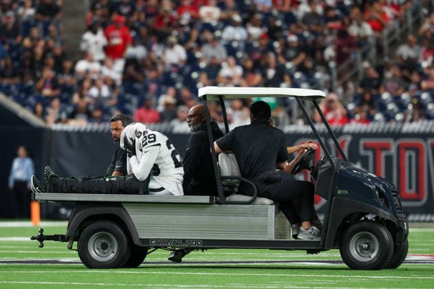 HOUSTON, TX - AUGUST 20: Cornerback Chigozie Anusiem 29 of the Las Vegas Raiders is carted off the field after injuring his leg during the NFL, American Football Herren, USA preseason game between the Houston Texans and the Las Vegas Raiders on August 20, 2026, at Reliant Stadium in Houston, TX. (Photo by David Buono Icon Sportswire) NFL: AUG 20 Raiders at Texans EDITORIAL USE ONLY Icon260820031
