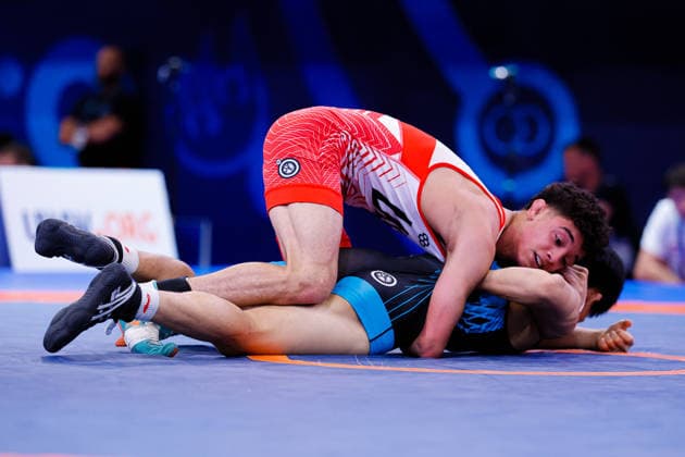 U20 World Championships 57kg FS - Isaiah Michael Cortez (USA) df. Chengtao Wang (CHN) *** U20 World Championships, 57 kg Freestyle: Isaiah Michael Cortez (USA) def. Chengtao Wang (CHN) Copyright: xKostadinxAndonovx
