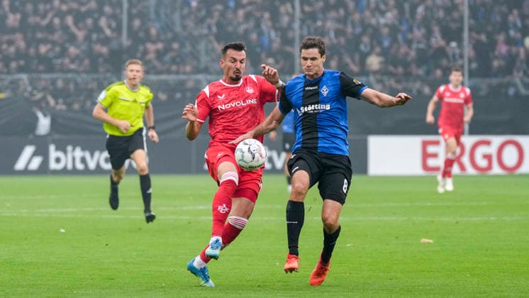 v.li.: Mergim Berisha (FCK, 20), Maximilian Thalhammer (SV Waldhof, 8), Zweikampf, Spielszene, Duell, duel, tackle, tackling, Dynamik, Action, Aktion, 21.08.2026, Mannheim (Deutschland), Fussball, DFB-Pokal, 1. Runde, SV Waldhof Mannheim - 1. FC Kaiserslautern, DFB DFL REGULATIONS PROHIBIT ANY USE OF PHOTOGRAPHS AS IMAGE SEQUENCES AND OR QUASI-VIDEO. *** v li Mergim Berisha FCK, 20, Maximilian Thalhammer SV Waldhof, 8, tackle, game scene, duel, tackle, tackling, dynamism, action, 08 21 2026, Mannheim, Germany, soccer, DFB Cup, 1st round, SV Waldhof Mannheim 1 vs. FC Kaiserslautern, DFB DFL REGULATIONS PROHIBIT ANY USE OF PHOTOGRAPHS AS IMAGE SEQUENCES AND OR QUASI-VIDEO xozx
