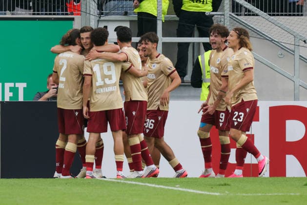 21.08.2026, xgrfx, Fussball DFB Pokal 1.Runde, Preußen Münster - Karlsruher SC v.l. Tor, Sebastian Jung zum 1:2 (Karlsruher SC) (DFL DFB REGULATIONS PROHIBIT ANY USE OF PHOTOGRAPHS as IMAGE SEQUENCES and or QUASI-VIDEO) Münster *** August 21, 2026, xgrfx, Soccer, DFB Cup First Round, Preußen Münster vs. Karlsruher SC, Goal, Sebastian Jung scores the 1-2 goal for Karlsruher SC. DFL and DFB regulations prohibit any use of photographs as image sequences and or quasi-video. Münster