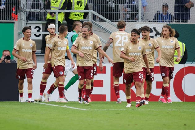 21.08.2026, xgrfx, Fussball DFB Pokal 1.Runde, Preußen Münster - Karlsruher SC v.l. Tor, Sebastian Jung zum 1:2 (Karlsruher SC) (DFL DFB REGULATIONS PROHIBIT ANY USE OF PHOTOGRAPHS as IMAGE SEQUENCES and or QUASI-VIDEO) Münster *** August 21, 2026, xgrfx, Soccer, DFB Cup First Round, Preußen Münster vs. Karlsruher SC, Goal, Sebastian Jung scores the 1-2 goal for Karlsruher SC. DFL and DFB regulations prohibit any use of photographs as image sequences and or quasi-video. Münster